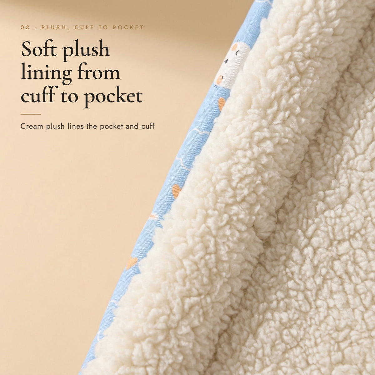 Close-up of the cream plush lining of the pet sleeping bag